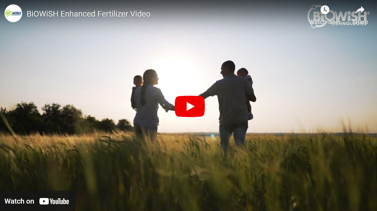 YouTube play button on image of farming family in a wheat field